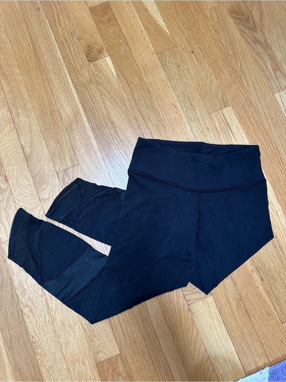Black lululemon capri leggings with mesh detail